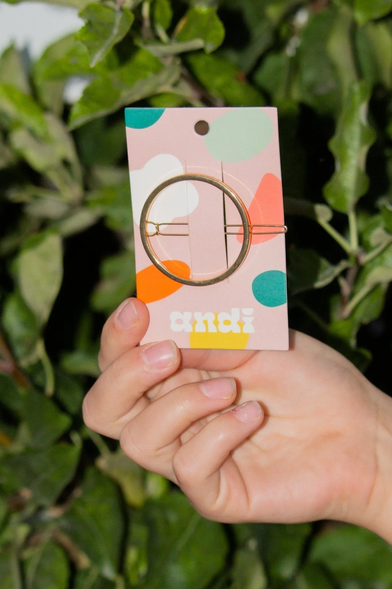Gold Circle Clip Andi